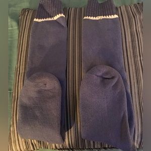 Sirocco- Ski socks in purple wool w/white line near top. Women’s 9-15